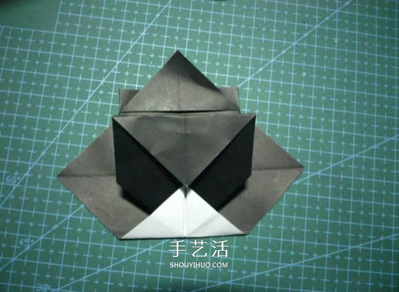 折一只国宝出来！可爱大熊猫的折纸方法图解 -  www.shouyihuo.com