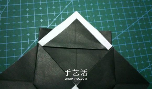 折一只国宝出来！可爱大熊猫的折纸方法图解 -  www.shouyihuo.com