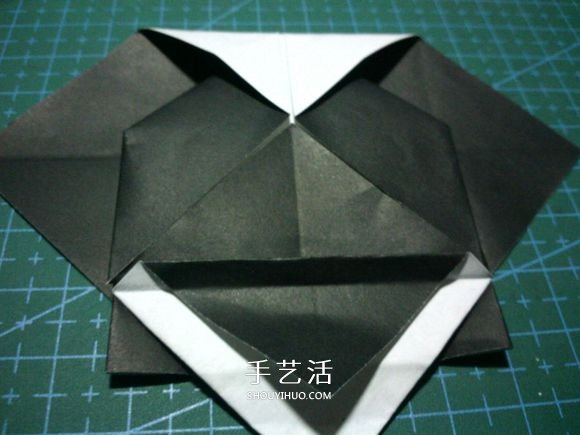 折一只国宝出来！可爱大熊猫的折纸方法图解 -  www.shouyihuo.com