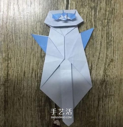 折纸站立大熊猫的图解教程 可爱的卡通形象 -  www.shouyihuo.com