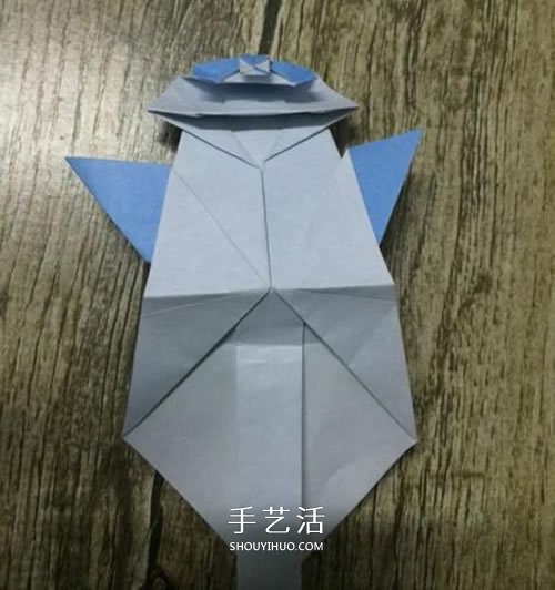 折纸站立大熊猫的图解教程 可爱的卡通形象 -  www.shouyihuo.com