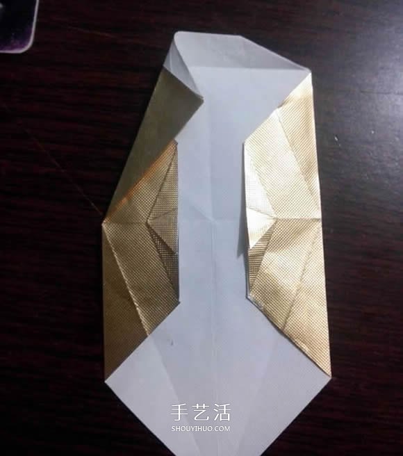 烟盒纸废物利用 手工折纸立体猫头鹰图解步骤 -  www.shouyihuo.com