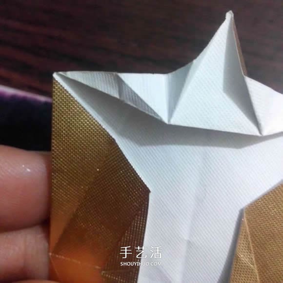 烟盒纸废物利用 手工折纸立体猫头鹰图解步骤 -  www.shouyihuo.com