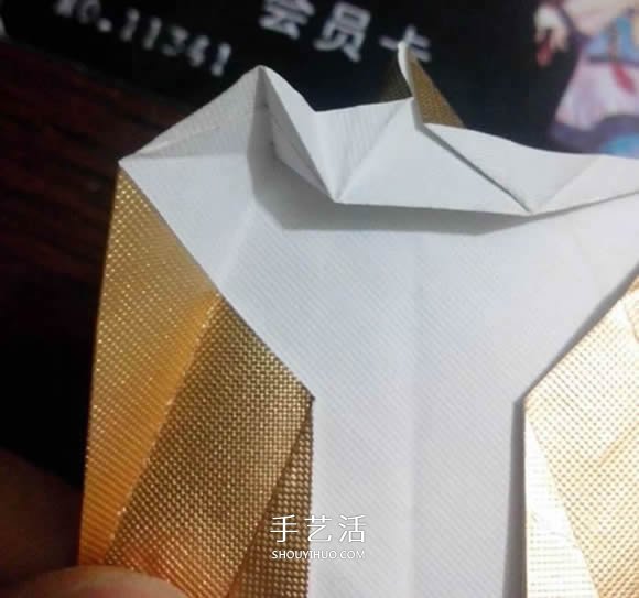 烟盒纸废物利用 手工折纸立体猫头鹰图解步骤 -  www.shouyihuo.com