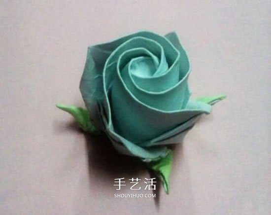 一张纸折玫瑰花的图解教程 连花萼也一起折出 -  www.shouyihuo.com