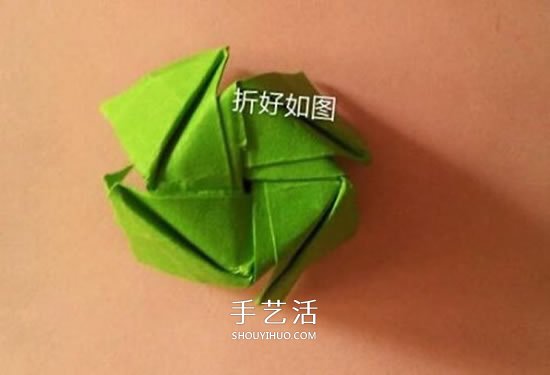 一张纸折玫瑰花的图解教程 连花萼也一起折出 -  www.shouyihuo.com