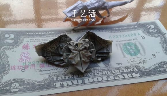 花心天使心的折法图解 好看美元折纸爱心教程 -  www.shouyihuo.com