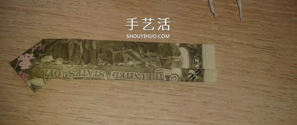 花心天使心的折法图解 好看美元折纸爱心教程 -  www.shouyihuo.com