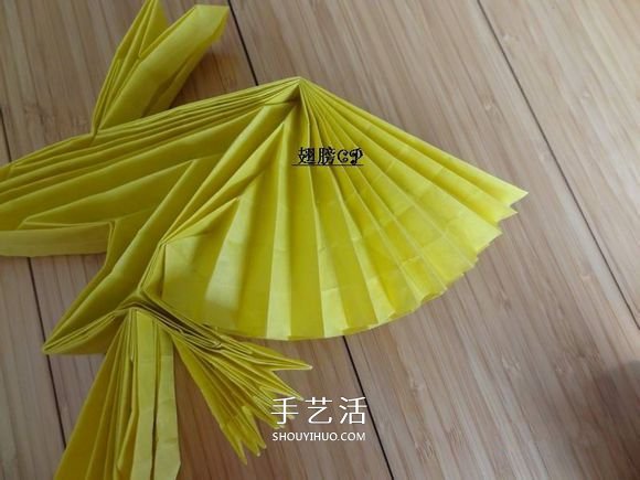鹰的折纸教程 手工折纸展开翅膀雄鹰的步骤图 -  www.shouyihuo.com