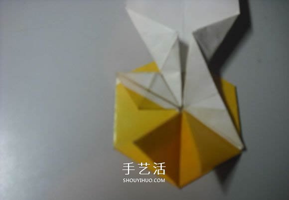 纸币勋章怎么折图解 手工折纸勋章的方法 -  www.shouyihuo.com