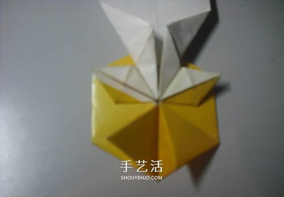 纸币勋章怎么折图解 手工折纸勋章的方法 -  www.shouyihuo.com