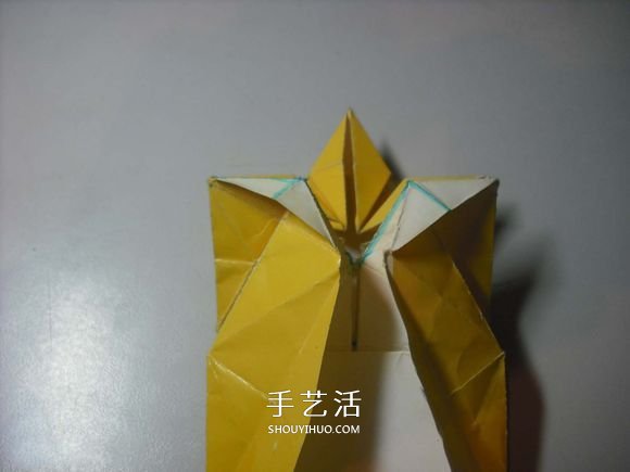 纸币勋章怎么折图解 手工折纸勋章的方法 -  www.shouyihuo.com