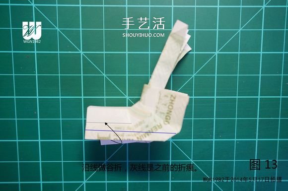 一元纸币折纸教程：鞋子里的芽苗的折法图解 -  www.shouyihuo.com