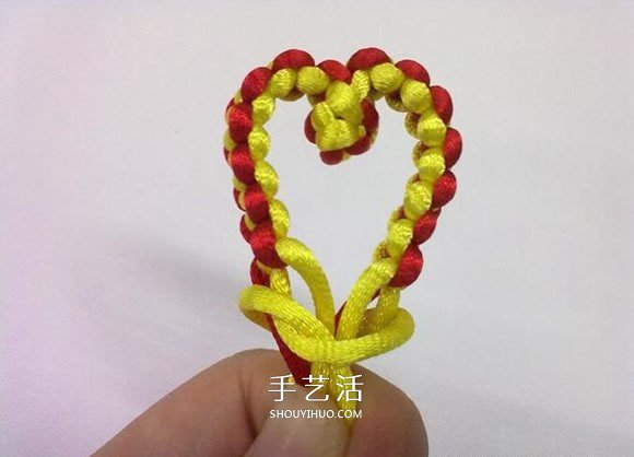 心形同心结怎么编图解 情人节爱心的编织方法 -  www.shouyihuo.com