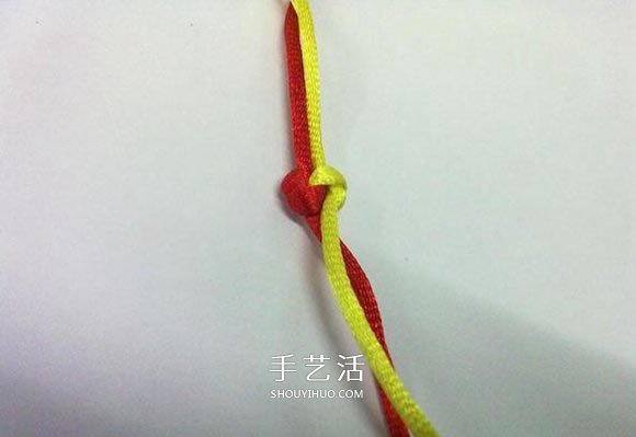 心形同心结怎么编图解 情人节爱心的编织方法 -  www.shouyihuo.com
