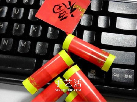 鞭炮挂饰手工制作教程 纸鞭炮怎么做的方法 -  www.shouyihuo.com