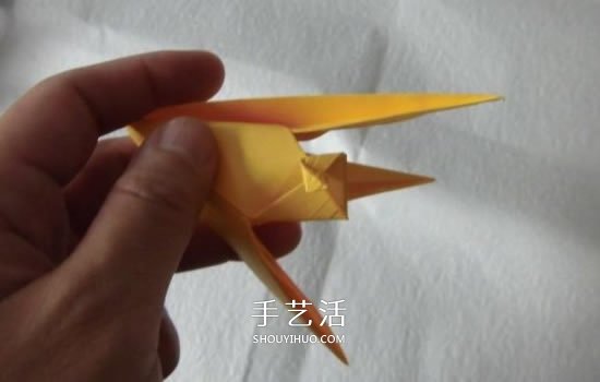 珠光海螺怎么折的教程 手工折纸海螺的步骤图 -  www.shouyihuo.com