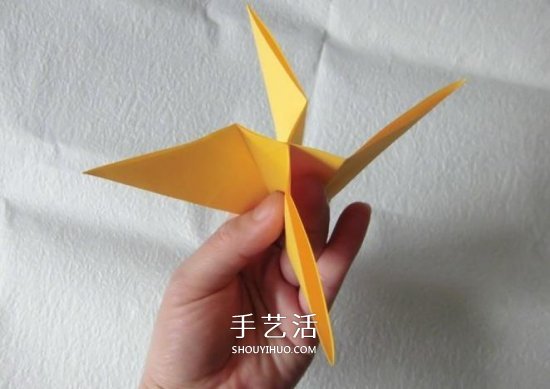 珠光海螺怎么折的教程 手工折纸海螺的步骤图 -  www.shouyihuo.com