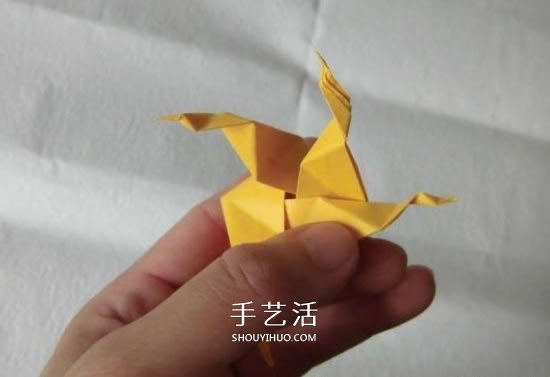珠光海螺怎么折的教程 手工折纸海螺的步骤图 -  www.shouyihuo.com