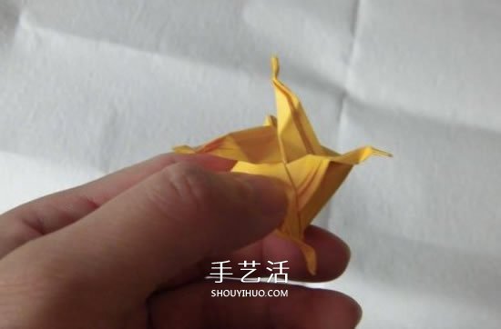 珠光海螺怎么折的教程 手工折纸海螺的步骤图 -  www.shouyihuo.com