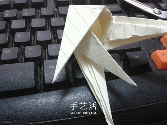 珠光海螺怎么折的教程 手工折纸海螺的步骤图 -  www.shouyihuo.com