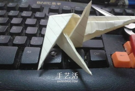 珠光海螺怎么折的教程 手工折纸海螺的步骤图 -  www.shouyihuo.com