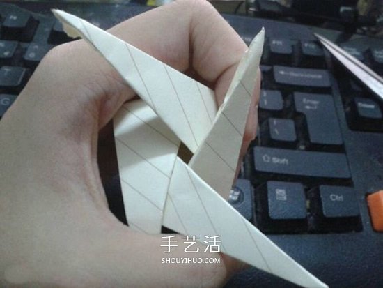 珠光海螺怎么折的教程 手工折纸海螺的步骤图 -  www.shouyihuo.com