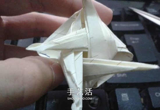 珠光海螺怎么折的教程 手工折纸海螺的步骤图 -  www.shouyihuo.com