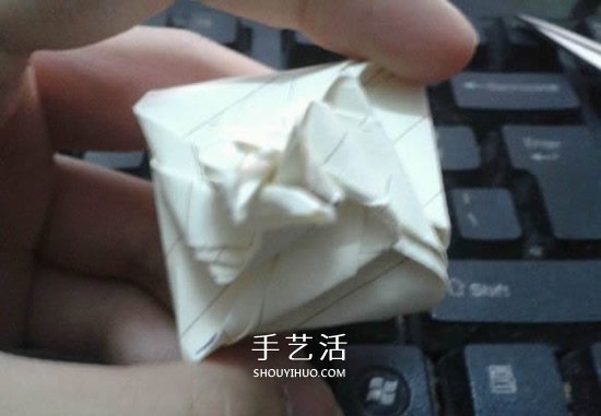珠光海螺怎么折的教程 手工折纸海螺的步骤图 -  www.shouyihuo.com