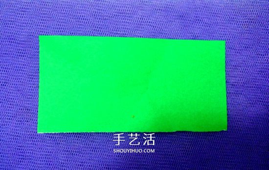 怎么折男T恤的图解教程 手工折纸T恤简单折法 -  www.shouyihuo.com