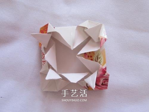 废纸折花型笔筒的折法 还可以当垃圾盒使用 -  www.shouyihuo.com