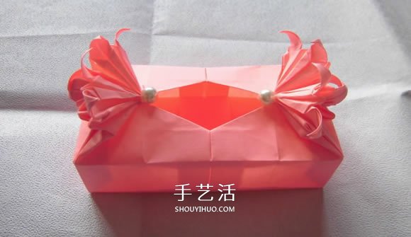 百合花纸巾盒的折法 带花纸巾盒怎么折图解 -  www.shouyihuo.com