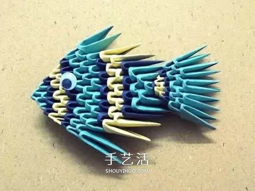 三角插小鱼折法图解 简单热带小鱼用三角插做 -  www.shouyihuo.com
