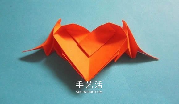 会飞的心折纸图解教程 折纸爱心的折法带翅膀 -  www.shouyihuo.com