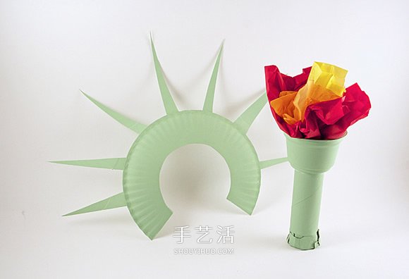 废物利用手工制作自由女神像和火炬的方法 -  www.shouyihuo.com