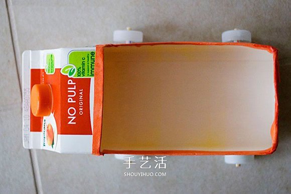 果汁盒废物利用 手工制作玩具小车的做法 -  www.shouyihuo.com