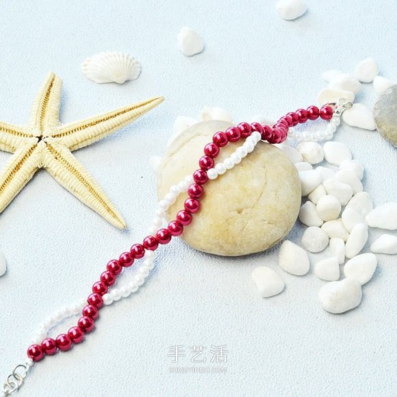 自制红白两色华丽珍珠手链的方法图解 -  www.shouyihuo.com
