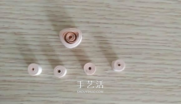 简单衍纸猫爪耳环的做法图解教程 -  www.shouyihuo.com