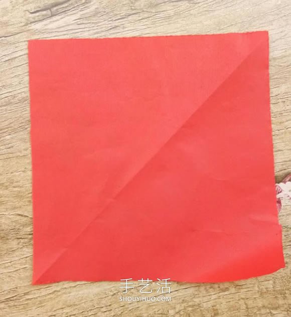 中国传统新年团花的剪纸方法步骤图解 -  www.shouyihuo.com