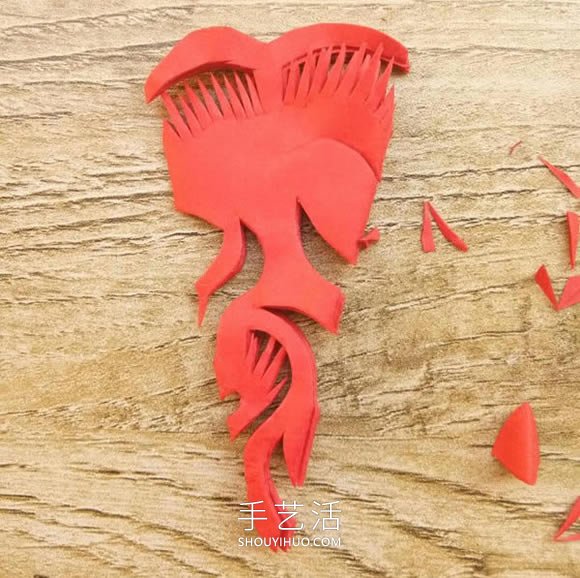 中国传统新年团花的剪纸方法步骤图解 -  www.shouyihuo.com