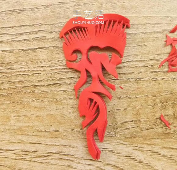 中国传统新年团花的剪纸方法步骤图解 -  www.shouyihuo.com