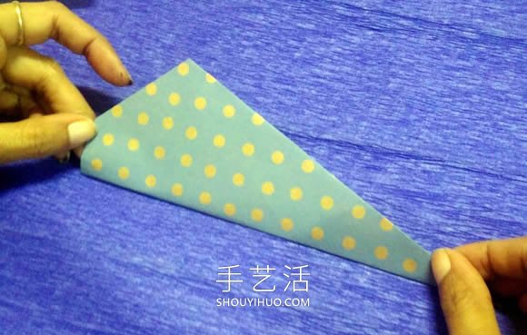 一步一步折纸鲸鱼的简单图解教程 -  www.shouyihuo.com