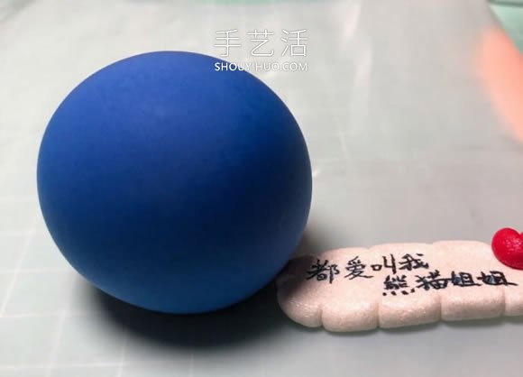 超轻粘土手工制作睡觉的哆啦A梦的做法图解 -  www.shouyihuo.com