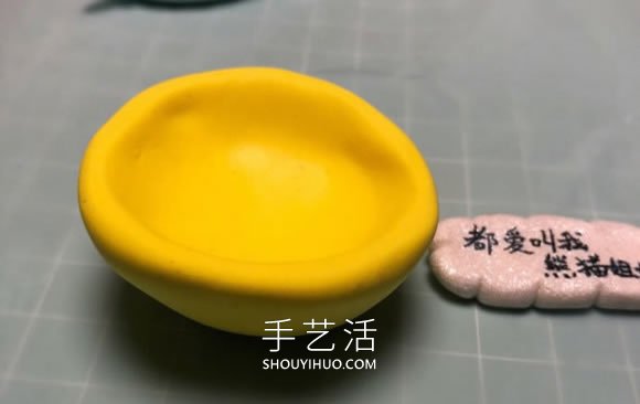 超轻粘土手工制作睡觉的哆啦A梦的做法图解 -  www.shouyihuo.com