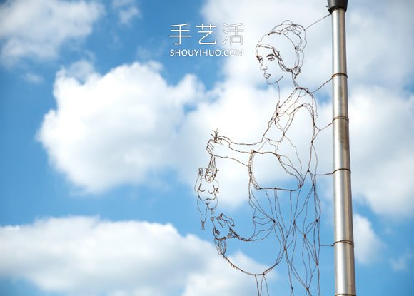 神奇铁丝艺术 DIY隐身路标路灯上的错位肖像 -  www.shouyihuo.com