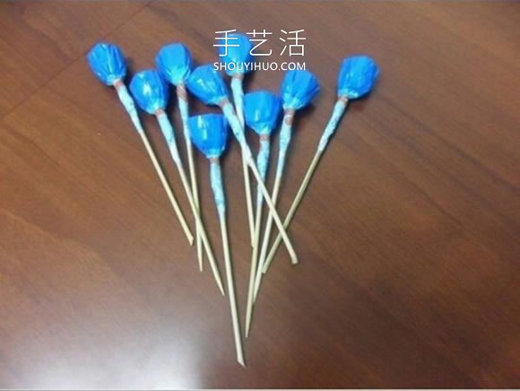 皱纹纸手工制作糖果花篮的做法教程 -  www.shouyihuo.com