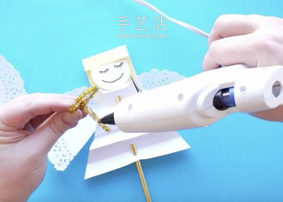 幼儿园手工制作天使木偶的做法教程 -  www.shouyihuo.com