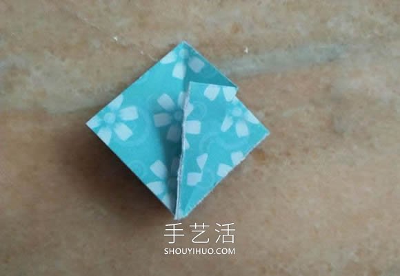 简单折纸漂亮雨伞的折法图解教程 -  www.shouyihuo.com