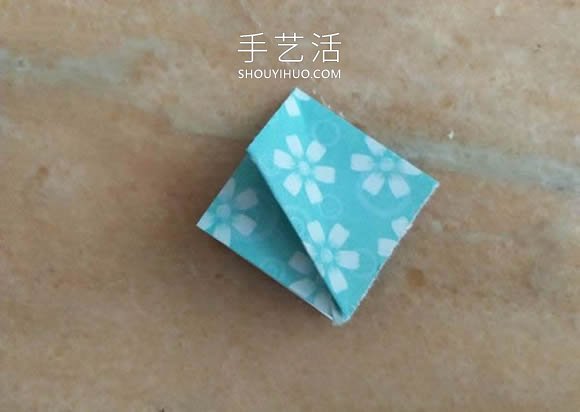 简单折纸漂亮雨伞的折法图解教程 -  www.shouyihuo.com