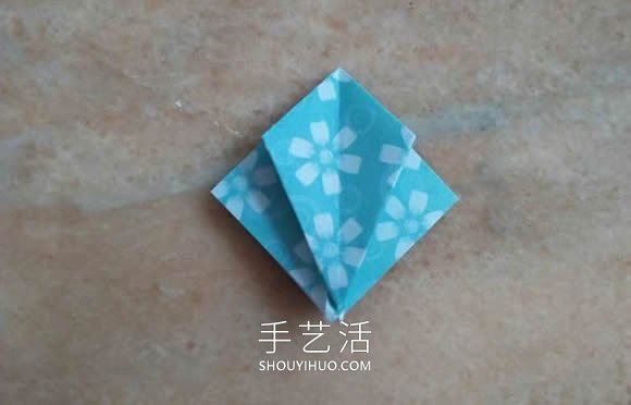 简单折纸漂亮雨伞的折法图解教程 -  www.shouyihuo.com